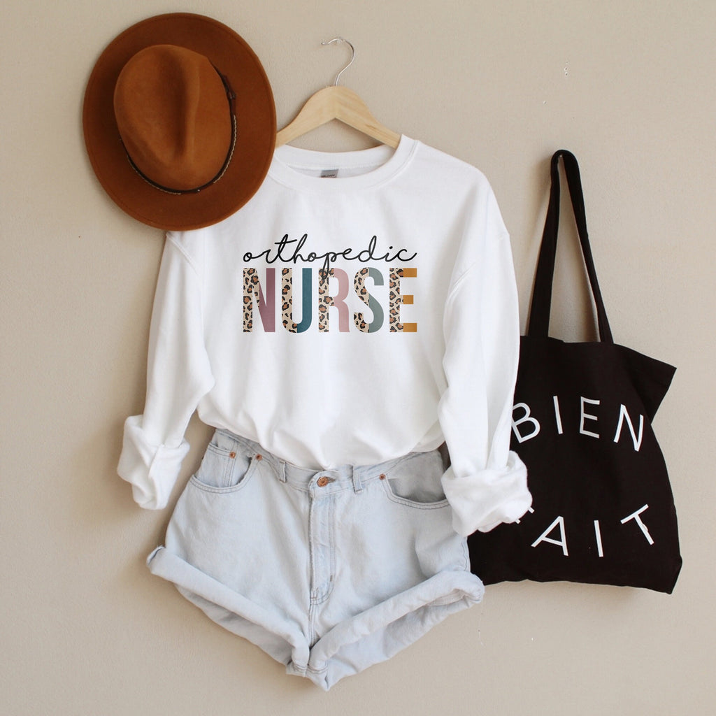 Ortho Nurse Sweatshirt - Orthopedic Nurse - Bone Hip Nurse - Gift For Nurse - Leopard / Cheetah - Unisex Crewneck Sweatshirt