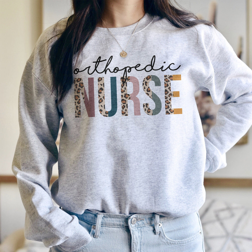 Ortho Nurse Sweatshirt - Orthopedic Nurse - Bone Hip Nurse - Gift For Nurse - Leopard / Cheetah - Unisex Crewneck Sweatshirt