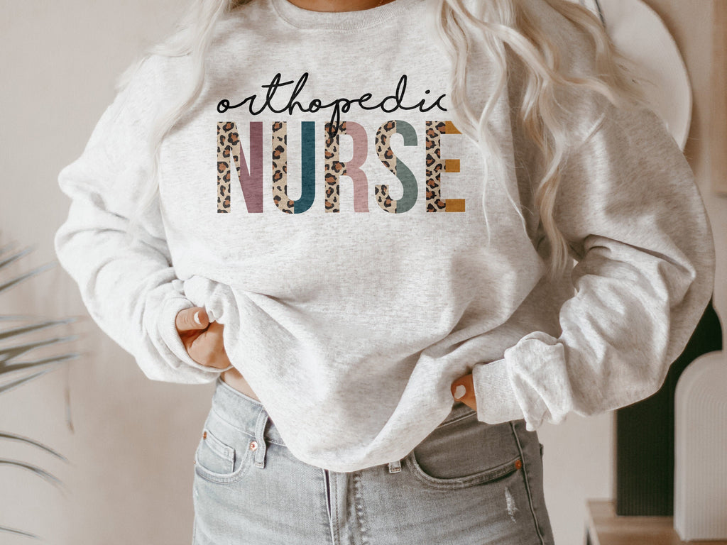 Ortho Nurse Sweatshirt - Orthopedic Nurse - Bone Hip Nurse - Gift For Nurse - Leopard / Cheetah - Unisex Crewneck Sweatshirt