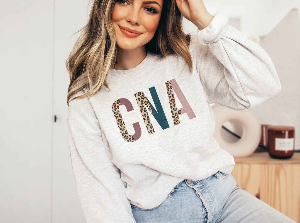 CNA Sweatshirt, Certified Nursing Assistant Gift, Leopard/Cheetah Animal Print, Healthcare Worker, Nurses Aid, Unisex Crewneck Sweatshirt