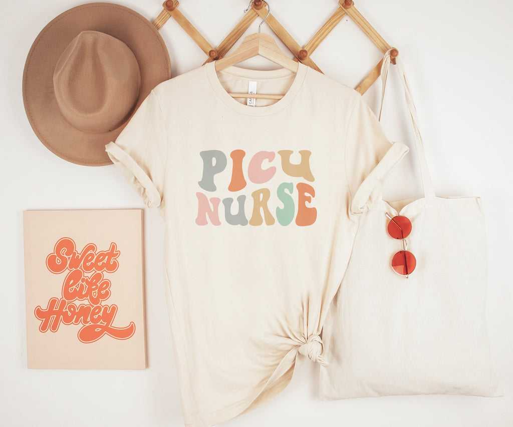 Groovy PICU Nurse Shirt, Pediatric Nurse, Nursing School Student Grad, Gift For New Nurse, PICU Nurses Week, Retro Unisex Graphic Tee